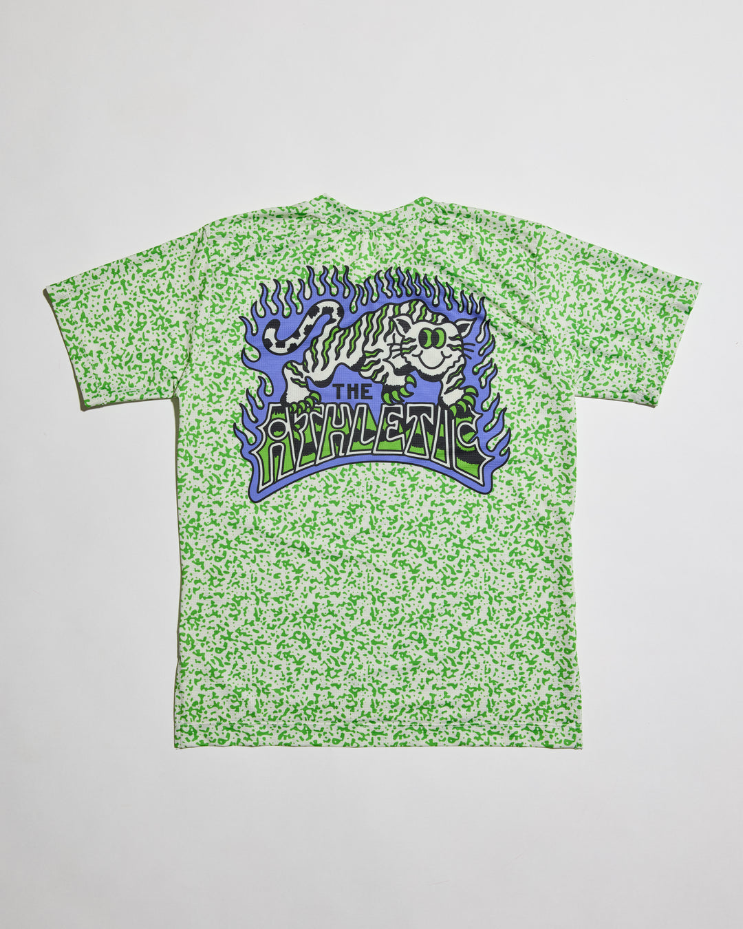 Performance Tech Tee for Running, MTB, Gravel, or Road cycling. Made in the USA by Endo Customs. This lightweight breathable shirt is perfect for when the temperature rises. This is a short sleeve tech tee with a tiger image on the back. Green  speckles over a off white color give it a 90's retro look. 