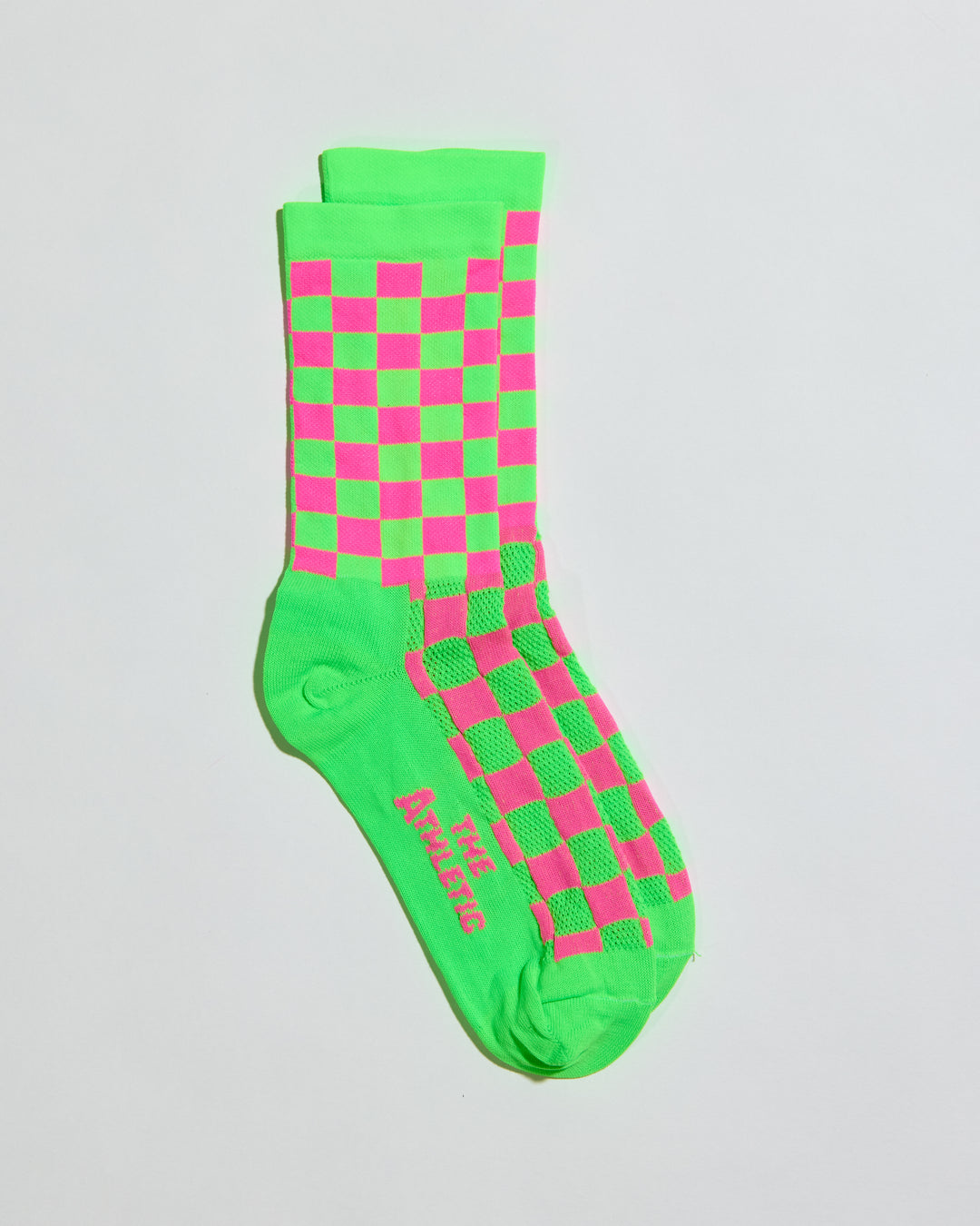 The SUPER TUFF Check Yourself Socks feature a bold checkerboard pattern, adding a rebellious flair to your athletic wear. Crafted for durability and comfort, these socks are perfect for activities like running, cycling, or hitting the gym. Made in the USA with recycled fibers, they combine style, performance, and sustainability