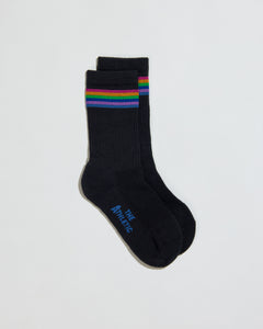 Black cushioned sock with with rainbow color band. Ribbed 5 inch cuff. Perfect for hiking, walking, or every day activities.