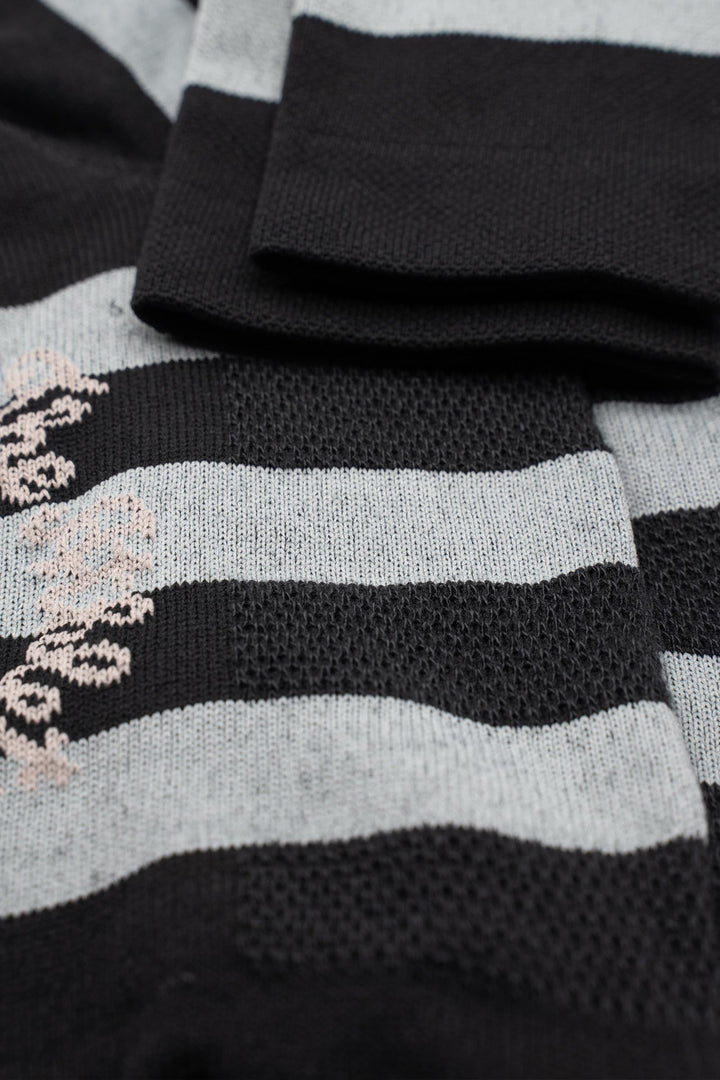 The New Favorite Striped Socks feature bold stripes in three unique designs—skull, flower, and death palm—offering a stylish update to classic patterns. Crafted for comfort and durability, these socks are perfect for running, cycling, and active lifestyles. Made with eco-friendly materials, they combine performance with sustainability