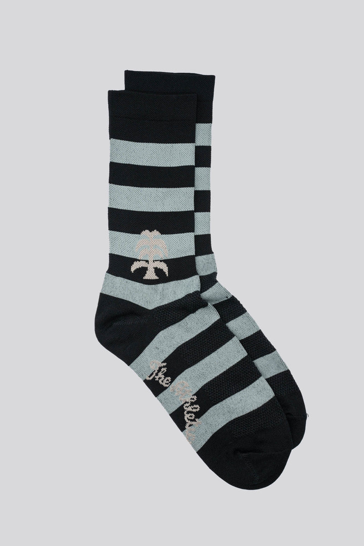 The New Favorite Striped Socks feature bold stripes in three unique designs—skull, flower, and death palm—offering a stylish update to classic patterns. Crafted for comfort and durability, these socks are perfect for running, cycling, and active lifestyles. Made with eco-friendly materials, they combine performance with sustainability