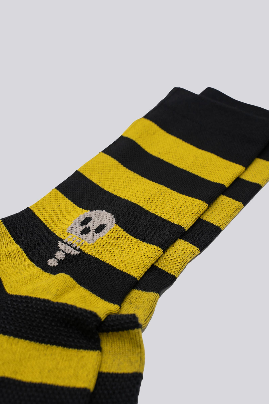 The New Favorite Striped Socks feature bold stripes in three unique designs—skull, flower, and death palm—offering a stylish update to classic patterns. Crafted for comfort and durability, these socks are perfect for running, cycling, and active lifestyles. Made with eco-friendly materials, they combine performance with sustainability