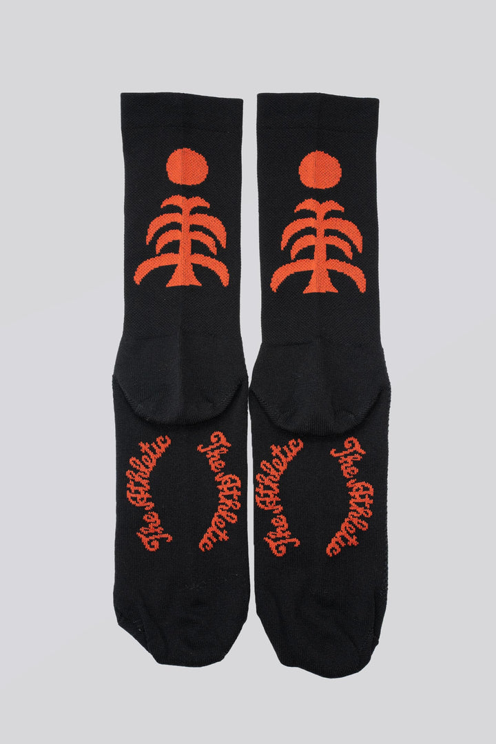 Death Palm Socks featuring a bold palm tree design, crafted for ultimate comfort and performance. Made from sustainable materials, perfect for running, cycling, and active athletes seeking style and eco-consciousness in their gear.