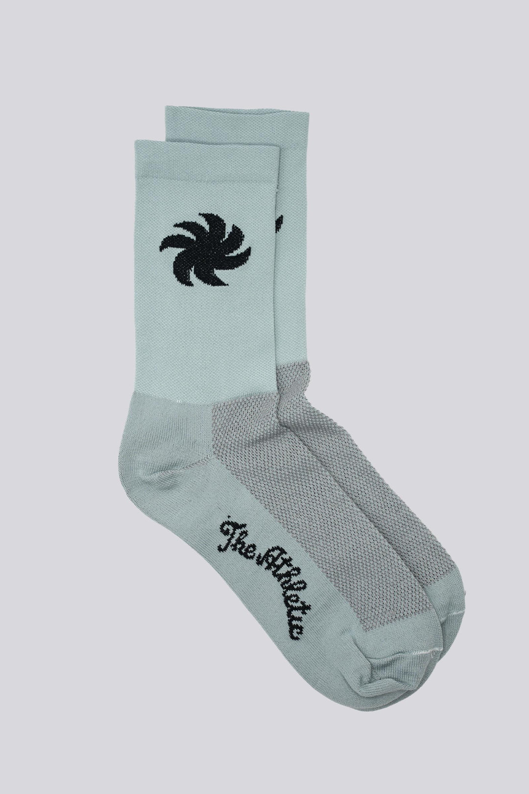 El Sol Socks with vibrant sun design, made from eco-friendly materials for ultimate comfort and performance. Perfect for running, cycling, and active lifestyles