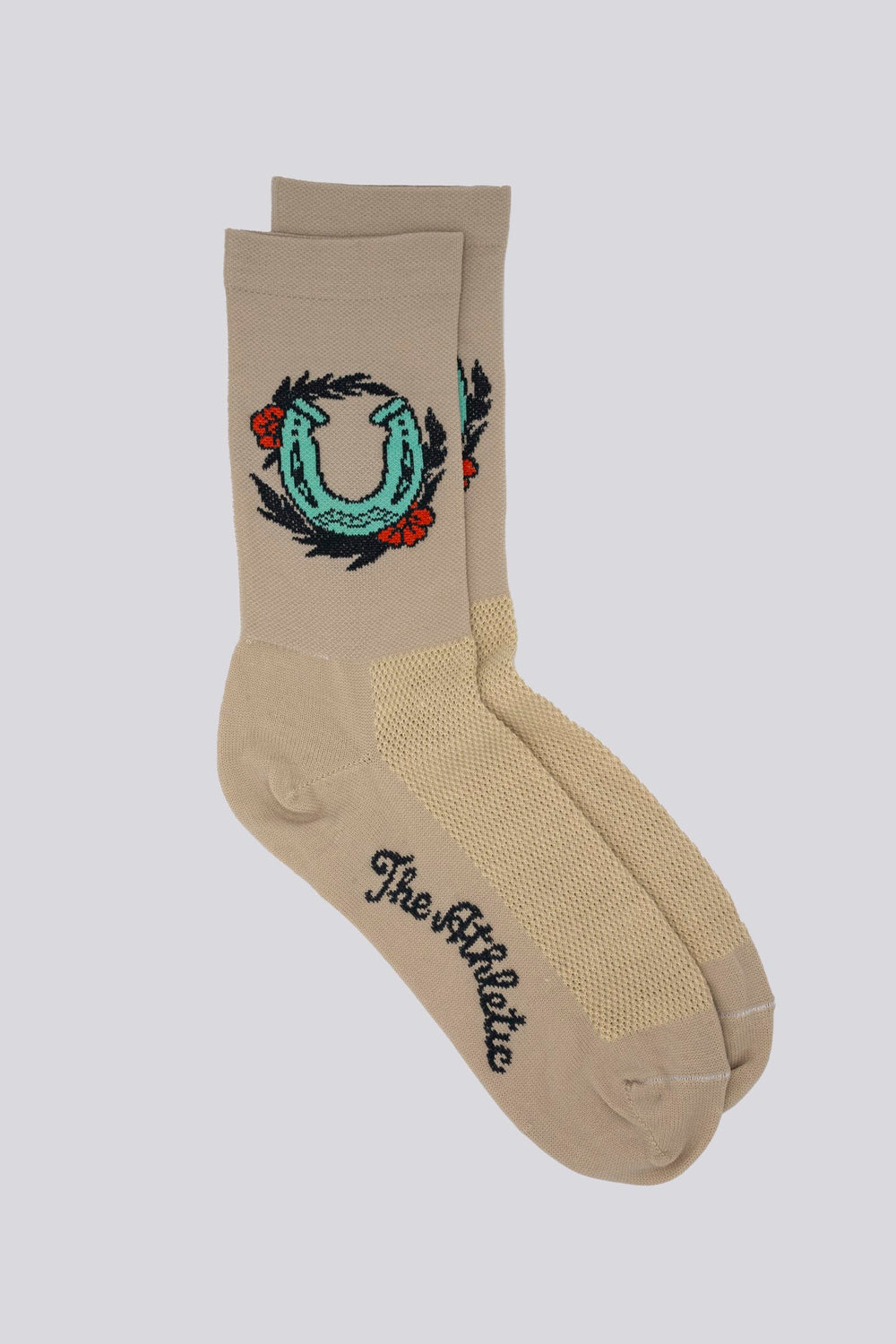 Horseshoe Tattoo Socks by Tyler Adams at The Athletic Community – Unique tattoo-inspired design for good luck, perfect for cycling, running, and everyday wear. Stylish, comfortable, and performance-ready