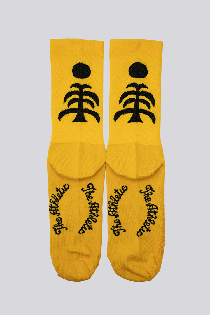 Death Palm Socks featuring a bold palm tree design, crafted for ultimate comfort and performance. Made from sustainable materials, perfect for running, cycling, and active athletes seeking style and eco-consciousness in their gear.