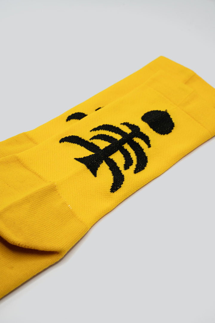 Death Palm Socks featuring a bold palm tree design, crafted for ultimate comfort and performance. Made from sustainable materials, perfect for running, cycling, and active athletes seeking style and eco-consciousness in their gear.