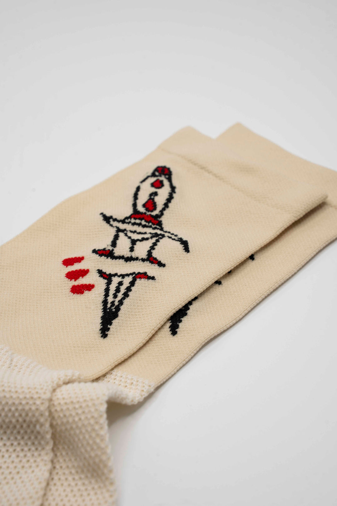 Dagger Tattoo Socks by Tyler Adams – Bold tattoo-inspired design for cycling, running, and daily wear. Stylish, comfortable, and designed for active lifestyles, bringing edge and performance to your wardrobe