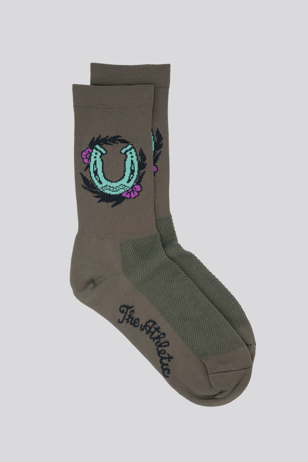 Horseshoe Tattoo Socks by Tyler Adams at The Athletic Community – Unique tattoo-inspired design for good luck, perfect for cycling, running, and everyday wear. Stylish, comfortable, and performance-ready