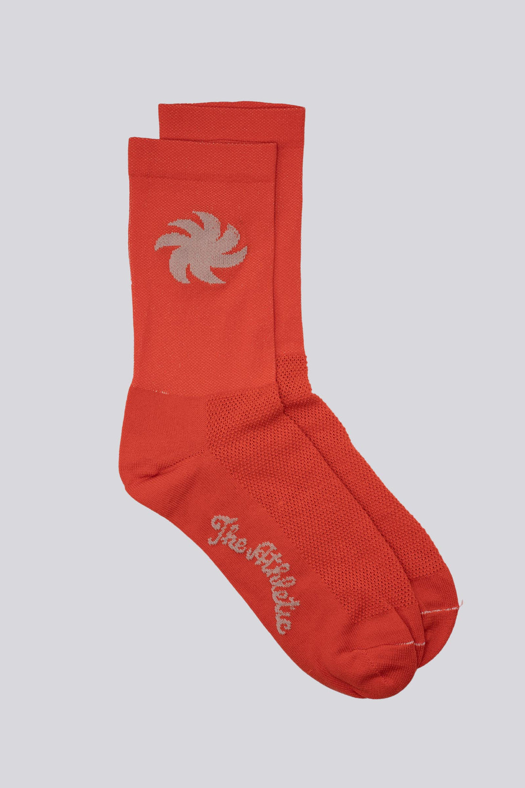 El Sol Socks with vibrant sun design, made from eco-friendly materials for ultimate comfort and performance. Perfect for running, cycling, and active lifestyles