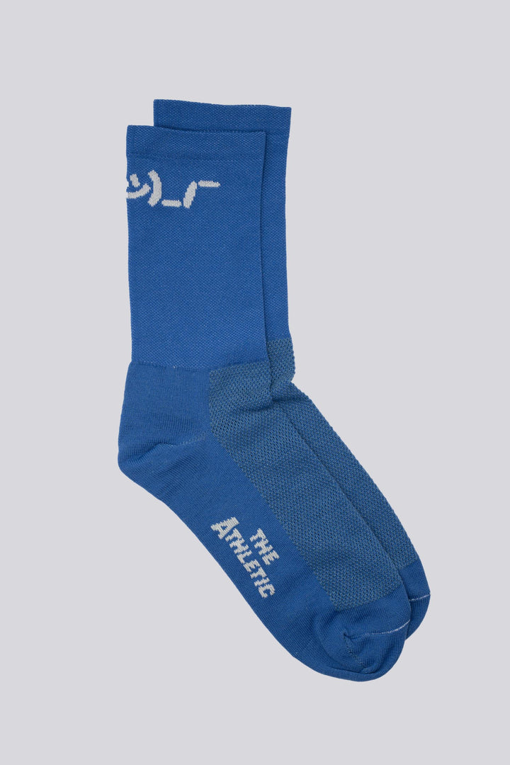 The Shruggie Socks are designed to add a touch of humor to your athletic wear. Crafted from a recycled synthetic fabric blend, these socks offer maximum performance for cycling, running, and cross-training. They feature a medium compression cuff and are suitable for all seasons