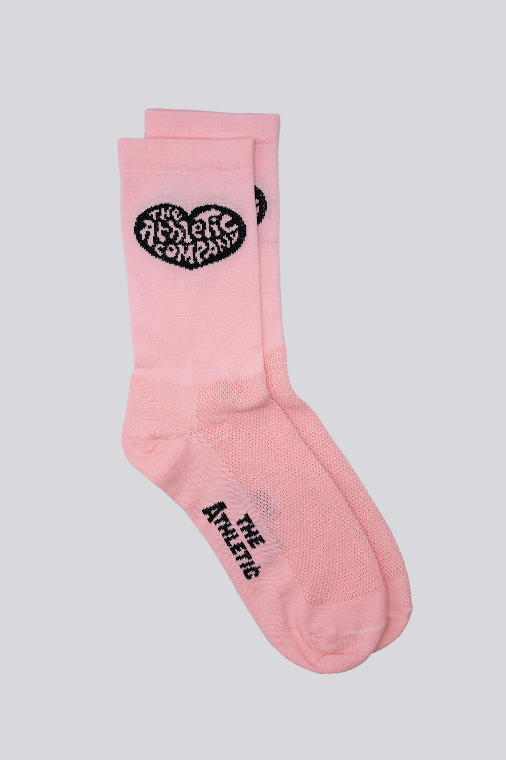 The Athletic Heart Socks are pink socks featuring a heart design on either side, specially designed for members of The Athletic Community. Perfect for cycling, running, and cross-training, these socks combine style and performance. Please note that this item is on final sale and is not eligible for returns or exchanges