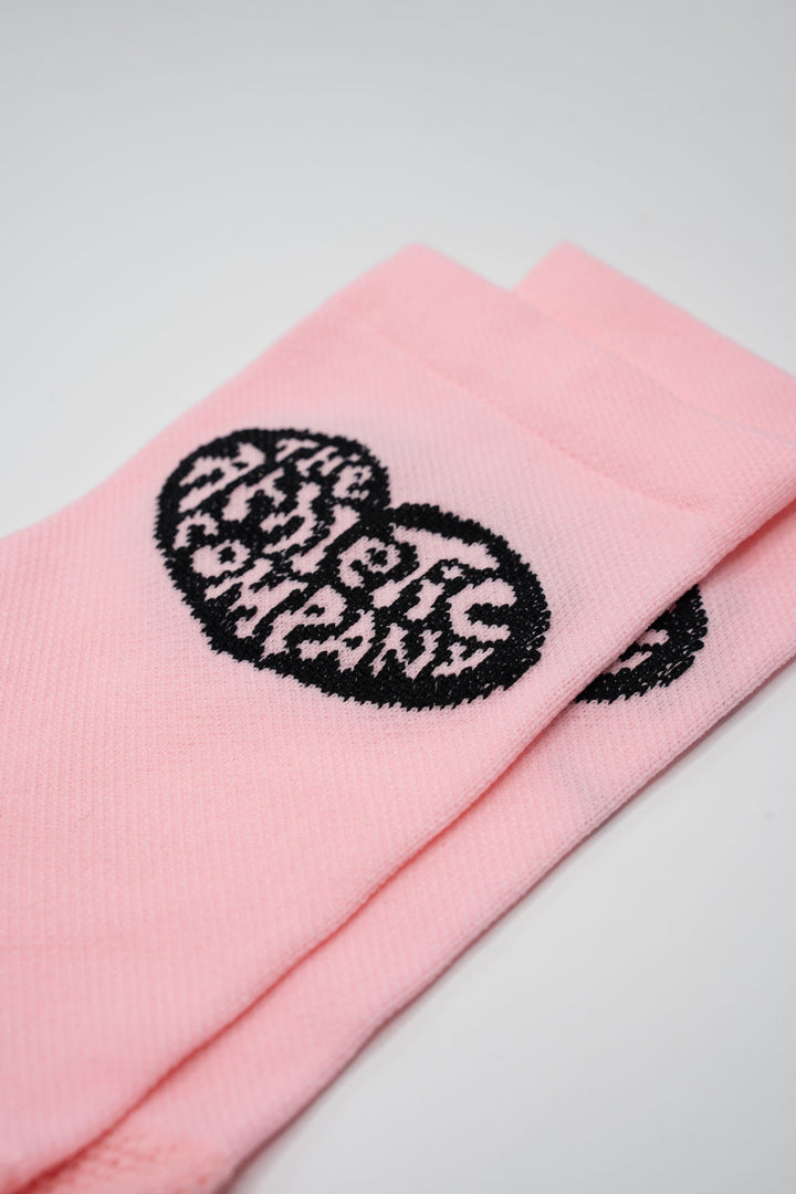 The Athletic Heart Socks are pink socks featuring a heart design on either side, specially designed for members of The Athletic Community. Perfect for cycling, running, and cross-training, these socks combine style and performance. Please note that this item is on final sale and is not eligible for returns or exchanges