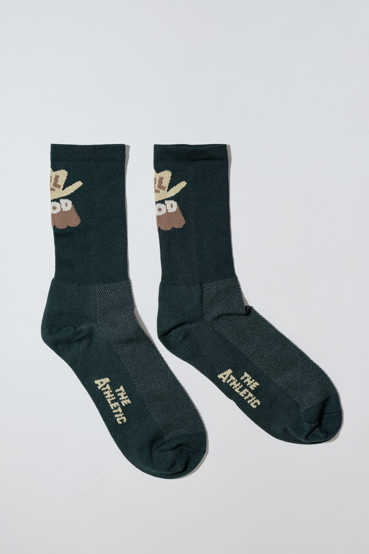 The ALL GOOD Cowboy Hat Socks are designed to add a touch of fun to your athletic wear, featuring a playful cowboy hat design. Ideal for cycling, running, and cross-training, these socks combine style and performance. Made in the USA with love, they offer both durability and comfort