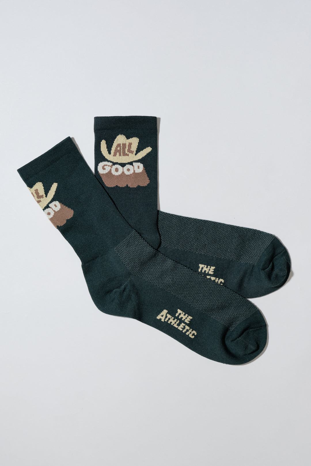 The ALL GOOD Cowboy Hat Socks are designed to add a touch of fun to your athletic wear, featuring a playful cowboy hat design. Ideal for cycling, running, and cross-training, these socks combine style and performance. Made in the USA with love, they offer both durability and comfort