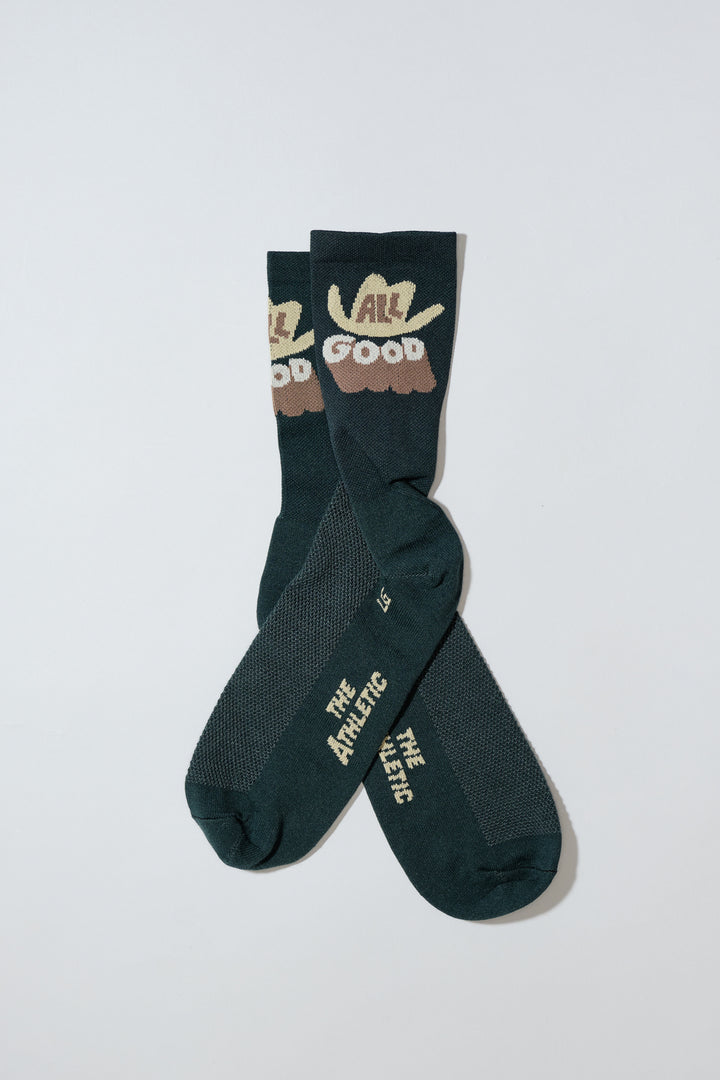 The ALL GOOD Cowboy Hat Socks are designed to add a touch of fun to your athletic wear, featuring a playful cowboy hat design. Ideal for cycling, running, and cross-training, these socks combine style and performance. Made in the USA with love, they offer both durability and comfort